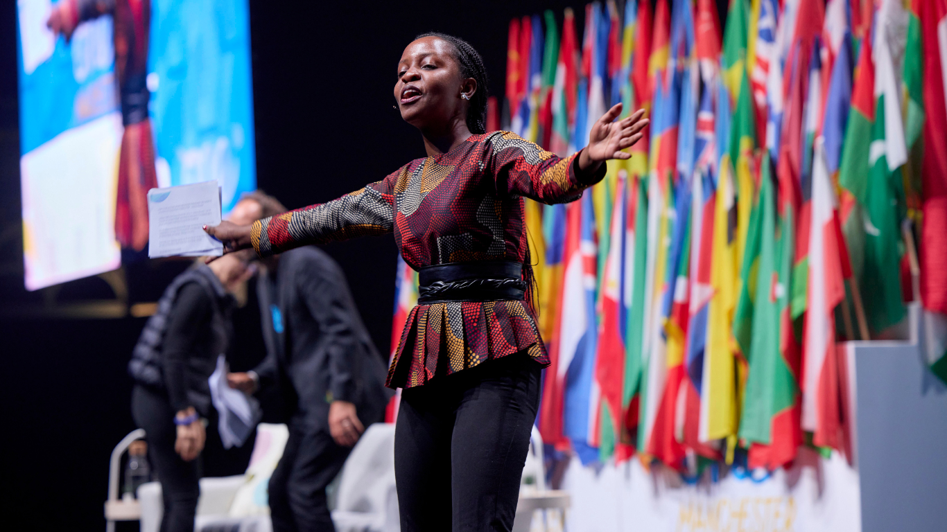 Coordinating Ambassadors on stage at the One Young World Summit Manchester 2022