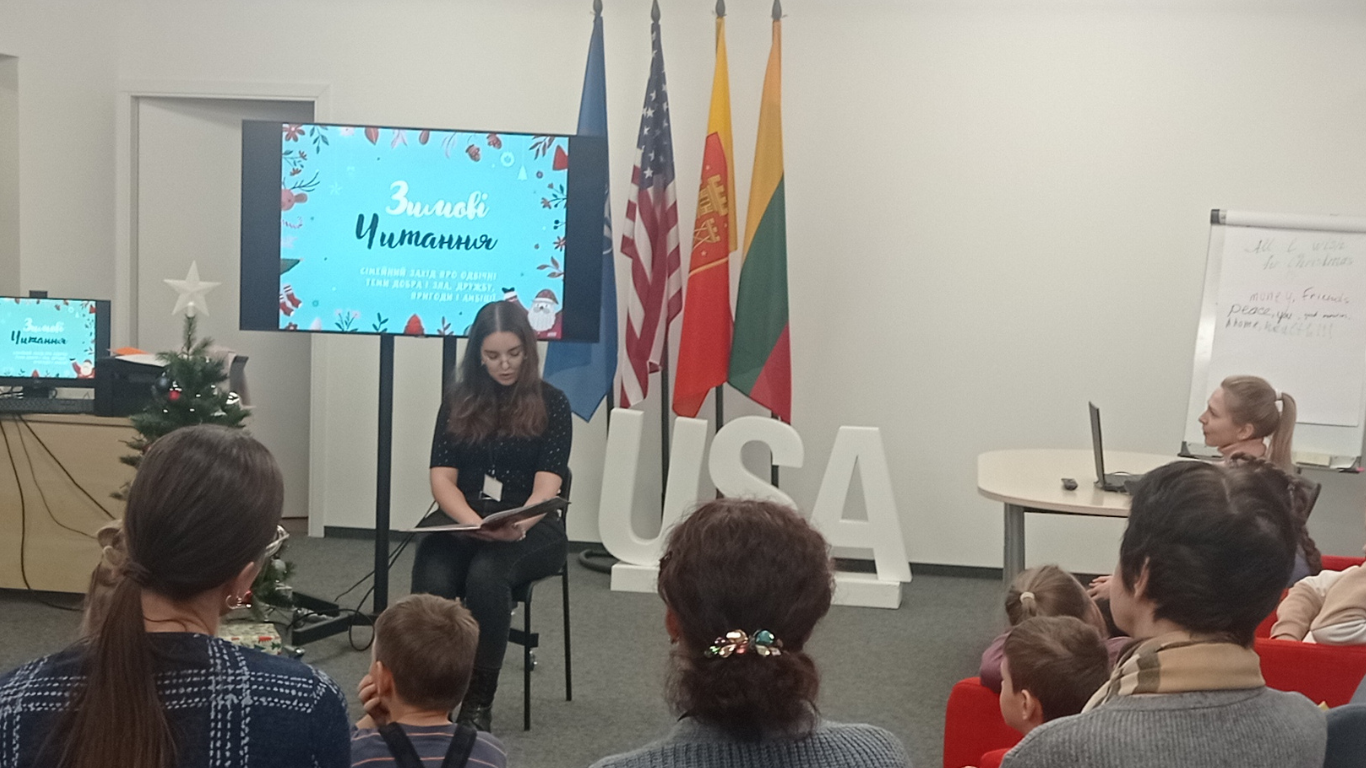 Kateryna Solodka reading to a group of children at Burlington Public Library