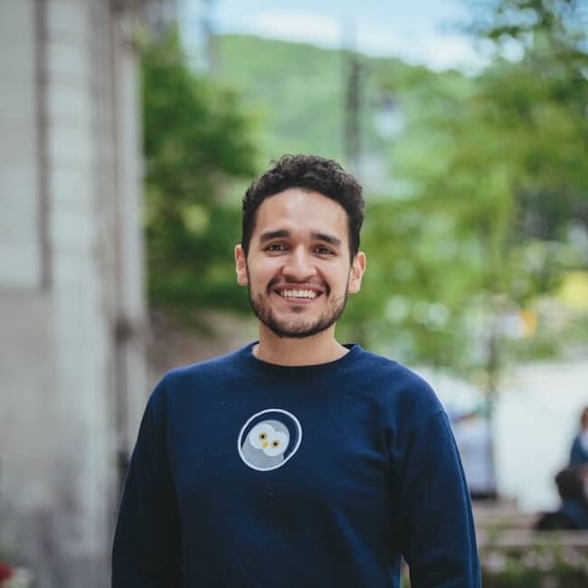 Jose Zea portrait photo against rural urban background